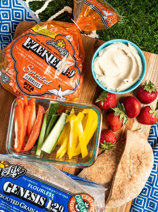 Food for Life Ezekiel pita picnic board with veggies and hummus