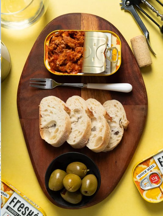 Freshé Sicilian Caponata open tin with bread and olives