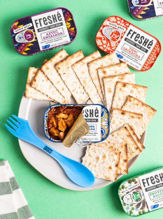 Freshé gourmet tuna meals with crackers flatlay